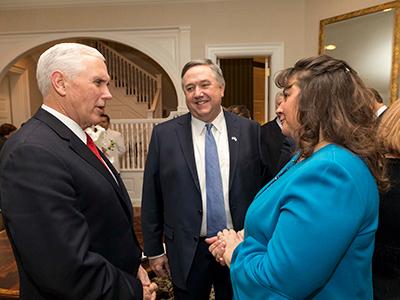 Vice President Mike Pence (left) greets CIU President Mark A. Smith and his wife Debbie at a "Faith Leaders Dinner" in 2018 (Photo courtesy White House Photo Office)