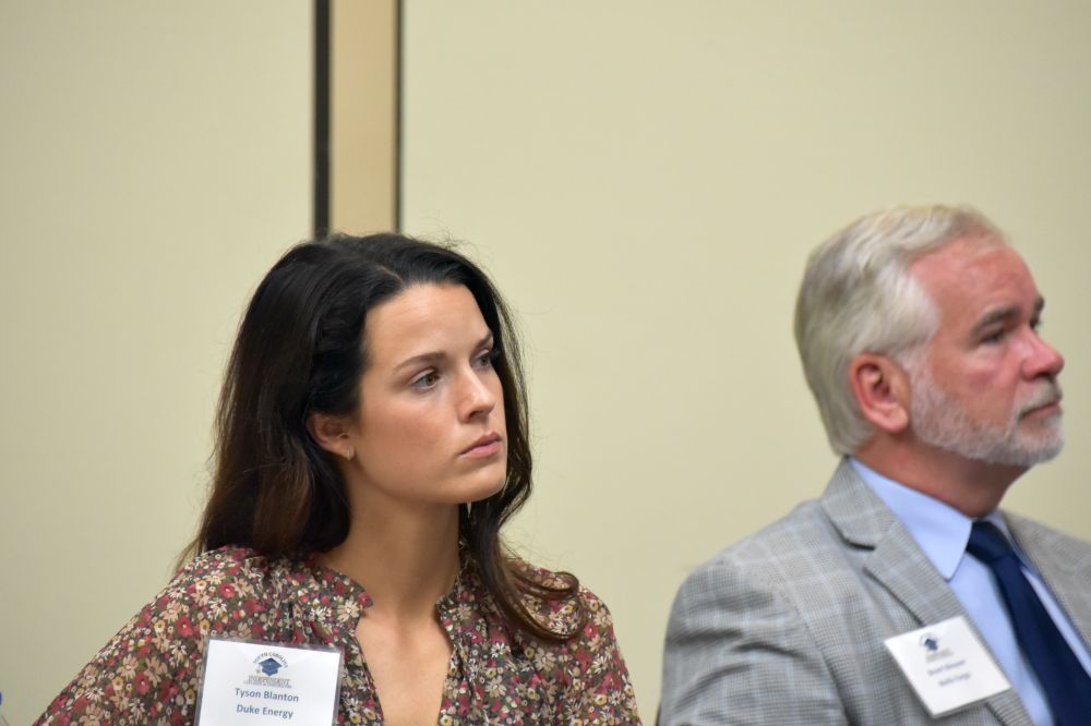 New SCICU trustee Tyson Blanton (Duke Energy, district manager for government and community relations) and SCICU trustee Brent Weaver (Wells Fargo, vice president for government banking) listen to the Development Committee report during the SCICU Oct. 13 board meeting.