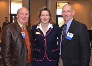 Lisa McWherter, Southern Wesleyan University’s vice president for advancement, is pictured with S.C. Sen. Thomas Alexander, left, and Central Town Administrator Phillip Mishoe, right, during the 2015 Legislative Appreciation Luncheon, held Feb. 23 at the university’s campus in Central. 