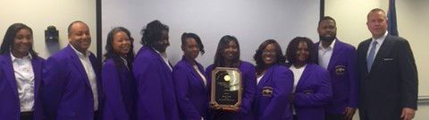 SC CHE Chair Tim Hofferth (far right) presents Benedict College SLLD Team with 2016 Service Learning Award.