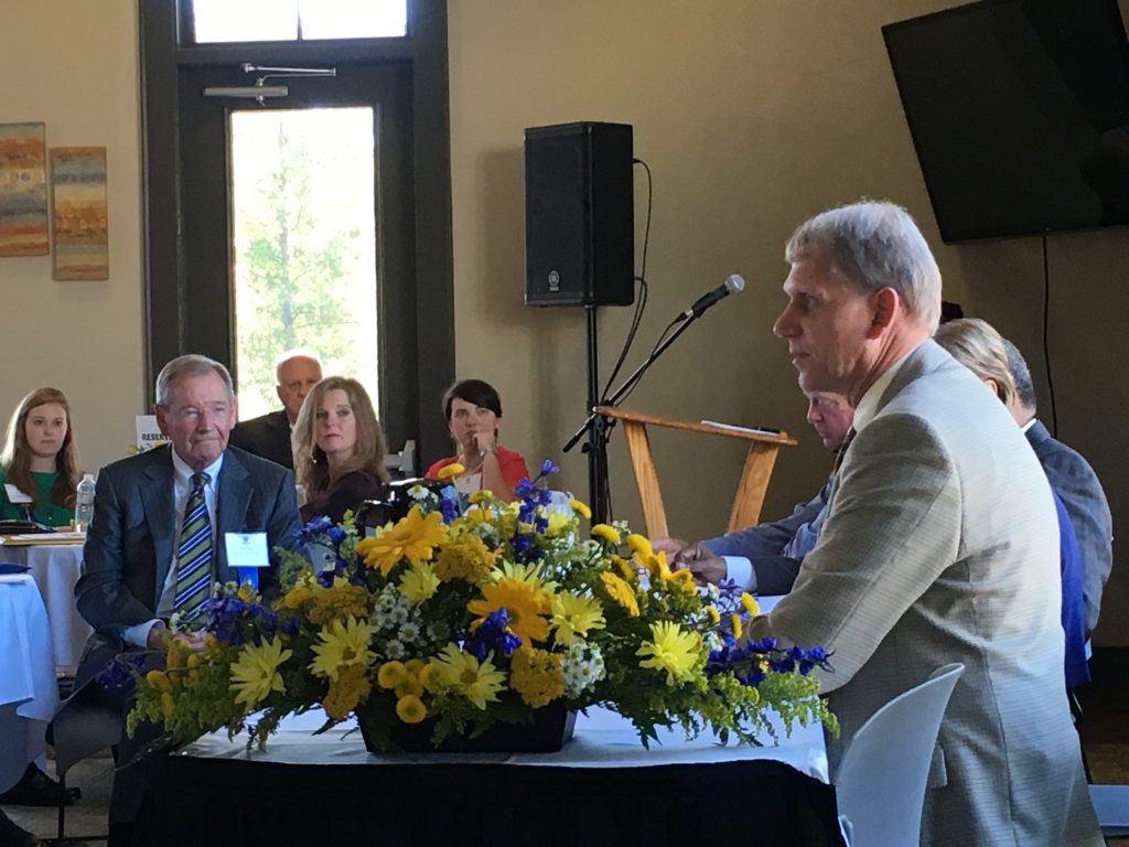 Dr. Todd Voss (pictured in foreground), president of Southern Wesleyan University, leads the Presidents' Panel Discussion.