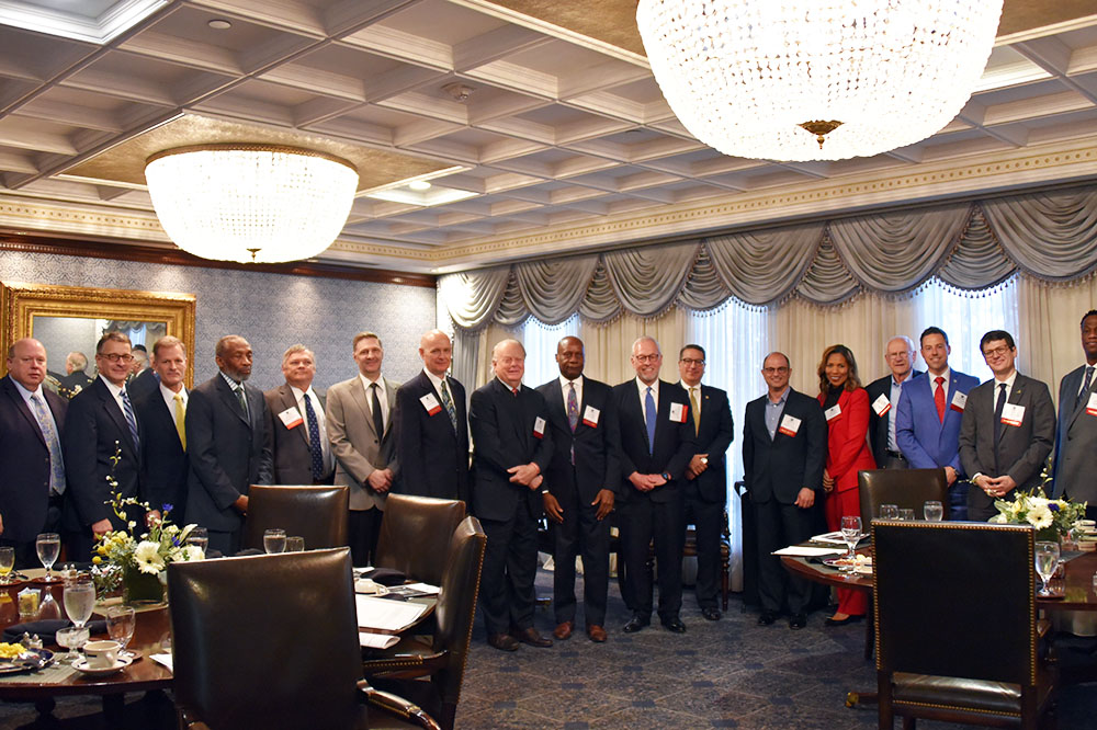16 college and university presidents gathered for the Spring 2022 SCICU Presidents' Breakfast.