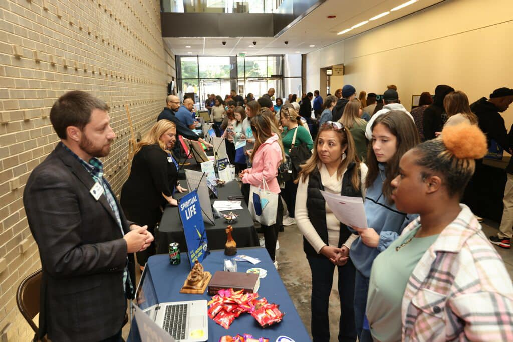 SMC campus representatives with Spiritual Life and other organizations answered questions for prospective students and their families.