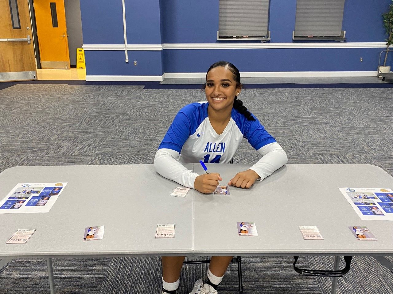 AU volleyball player signs the university's first-ever NIL deal.